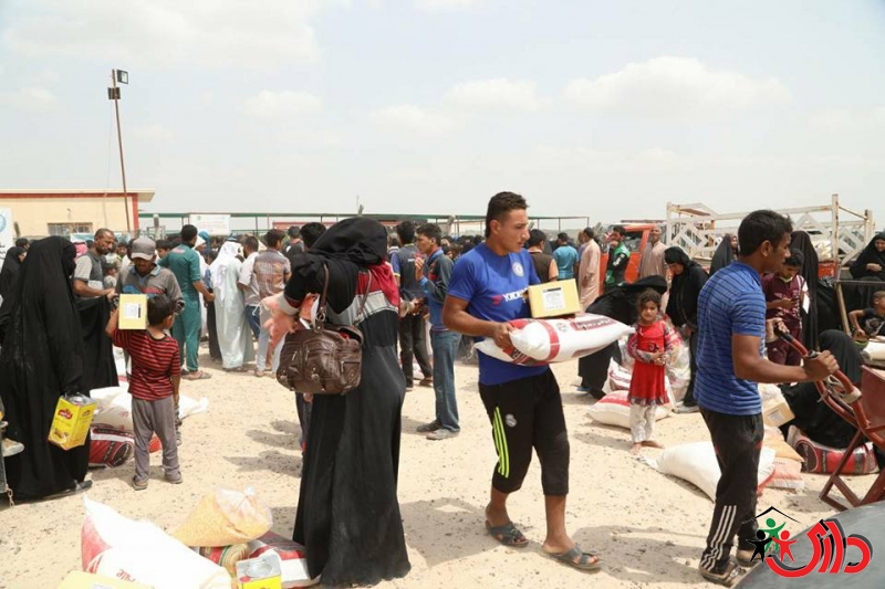 Dary Human Organization distributes 130 food baskets to Anbar displaced people